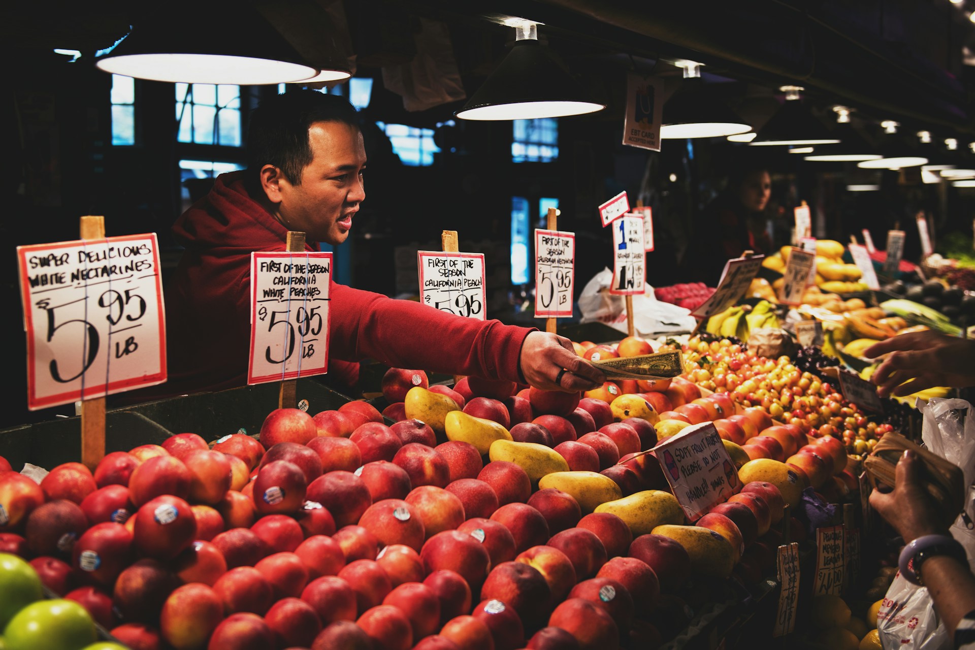 Shoppers seeking deals at a farmer's market